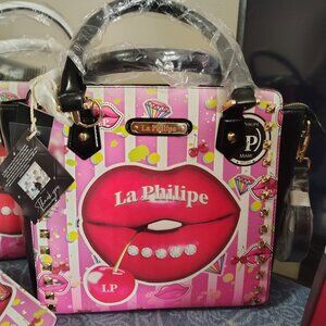 La Philipe New with tags, Juicy lips collection with black trim and handles.
